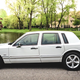 Illustration for article titled This Cheap-Looking Lincoln Town Car Has Way More Power Than A Charger Hellcat